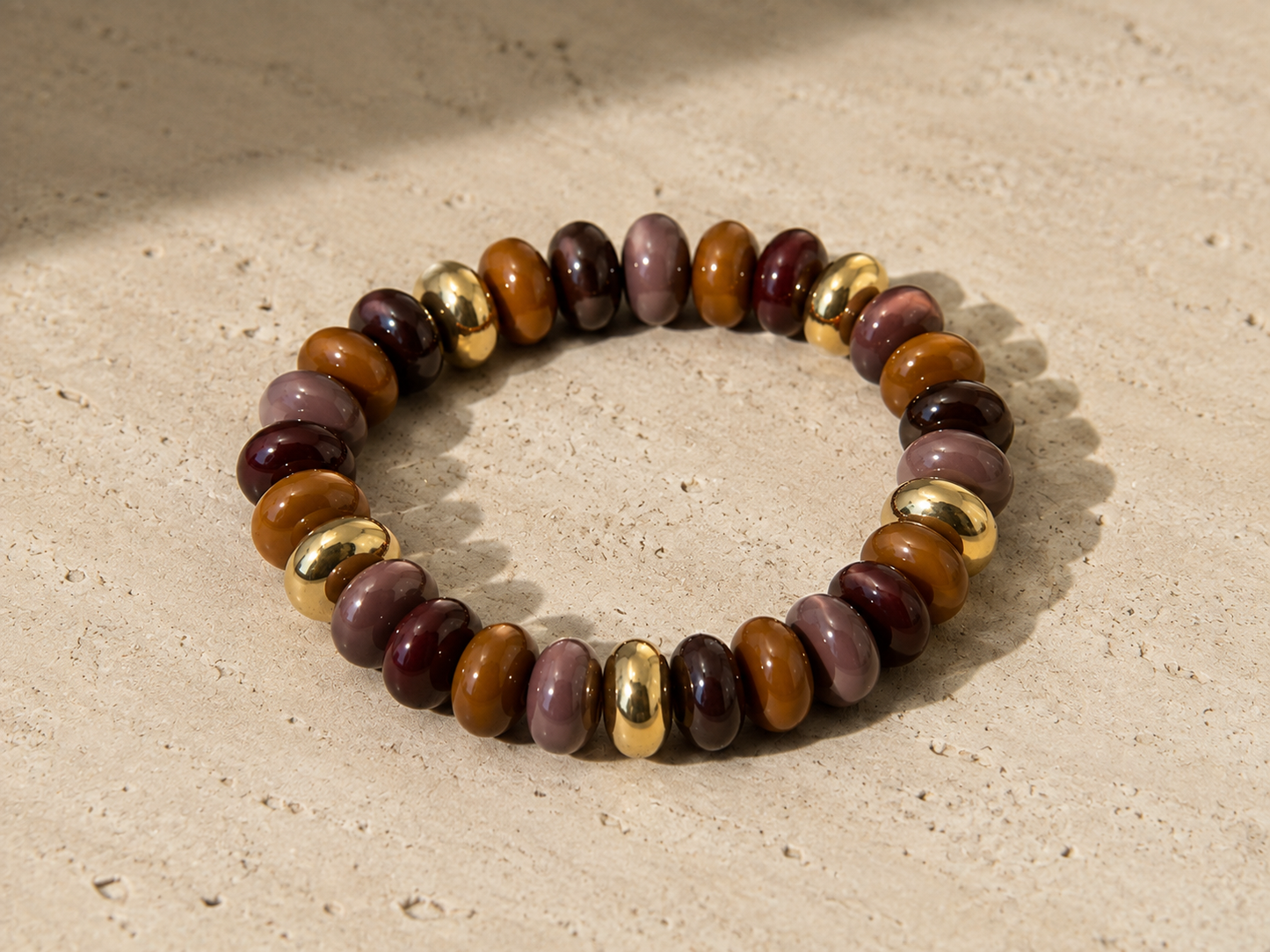 Perlenarmband mit Gold